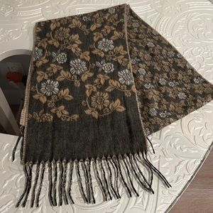 Floral scarf. 10” x 64” not including fringe. 100% acrylic.